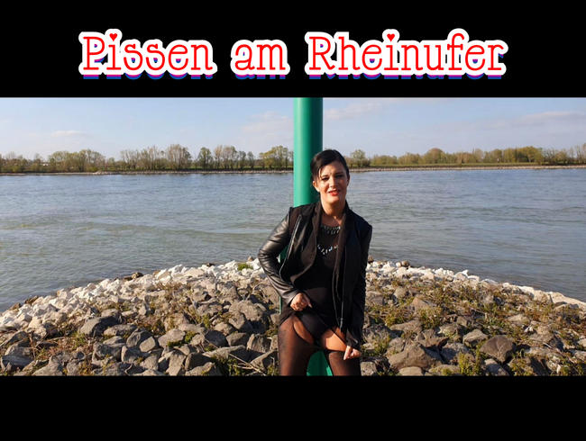 Pissen am Rheinufer